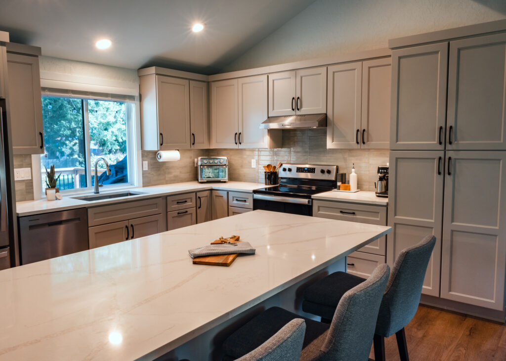 Edmonds Kitchen, with a closer view of the surface of the kitchen island and the cabinetry.